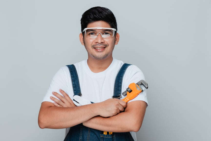 Man Holding Wrench